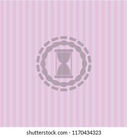 hourglass icon inside retro pink emblem