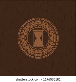 hourglass icon inside retro style wood emblem