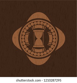 hourglass icon inside retro wood emblem