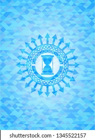 hourglass icon inside sky blue emblem with triangle mosaic background