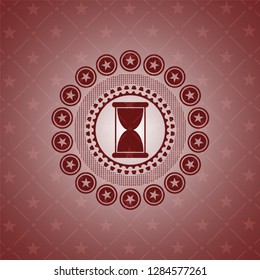hourglass icon inside vintage red emblem