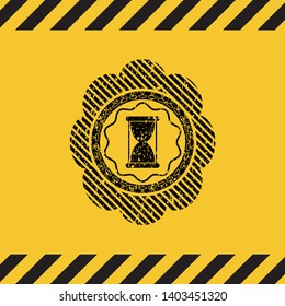 hourglass icon inside warning sign, black grunge emblem. Vector Illustration. Detailed.