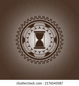 hourglass icon inside wood emblem. Retro. 