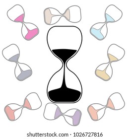 Hourglass on a background of scattered hourglasses with colored sand isolated on white background.
