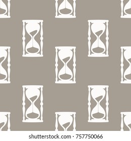 Hourglass. Seamless vintage pattern with hourglass. Vector element for design.