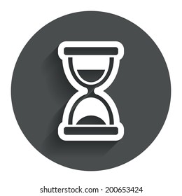 Hourglass sign icon. Sand timer symbol. Circle flat button with shadow. Modern UI website navigation. Vector