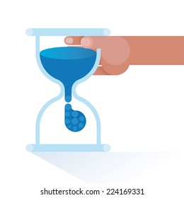 Hourglass timer by hand business concept