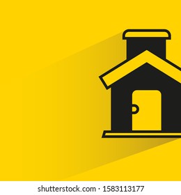 house building with drop shadow yellow background