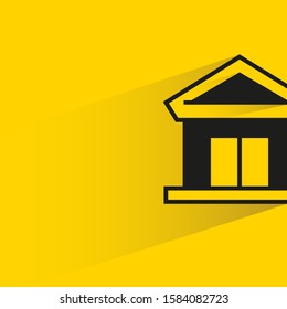 house building with drop shadow yellow background