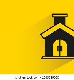 house building with drop shadow yellow background