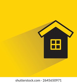 house building icon with shadow on yellow background