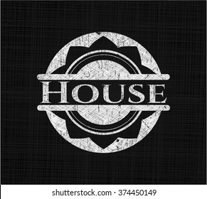 House chalkboard emblem on black board