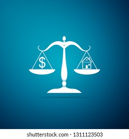 House and dollar symbol on scales icon isolated on blue background. Flat design. Vector Illustration
