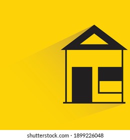 house with drop shadow on yellow background