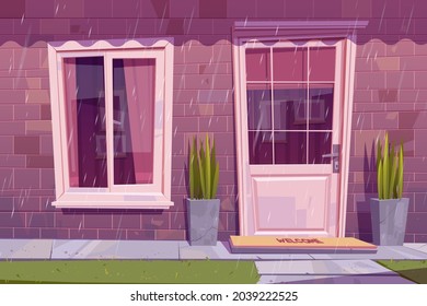 House facade with closed door, window and brick wall in rain. Vector cartoon building exterior, home front with welcome mat on doorstep, plants and green grass at rainy weather