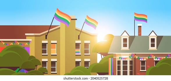 house facade decorated with LGBT rainbow flags lesbian gay parade transgender love concept horizontal