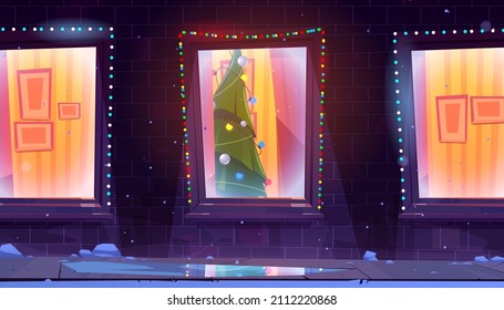 House facade with windows and Christmas tree inside. Vector cartoon illustration of residential building exterior, snow, holiday garlands on brick wall and Xmas fir in home