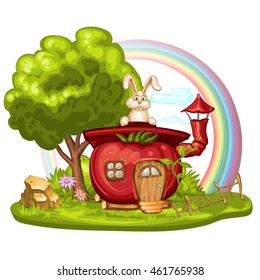 House for gnome made from tomato with tree and rainbow