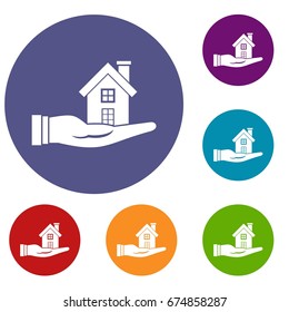 House in hand icons set in flat circle reb, blue and green color for web