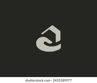 A house in hand logo design. Home real estate building logotype. Safe home concept. Vector illustration.