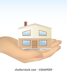 The house in hand. Vector