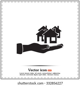 House in hand vector icon.