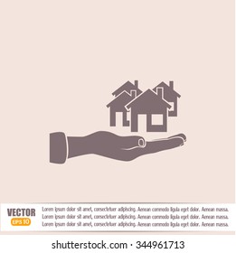 House in hand vector icon.