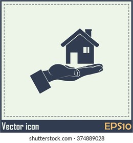 House in hand vector icon.