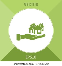 House in hand vector icon.