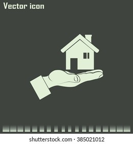 House in hand vector icon.