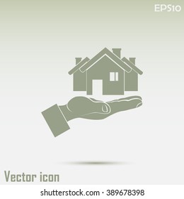 House in hand vector icon.
