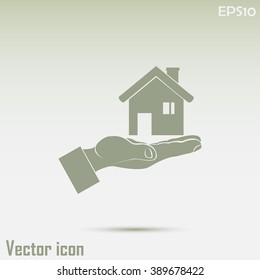 House in hand vector icon.