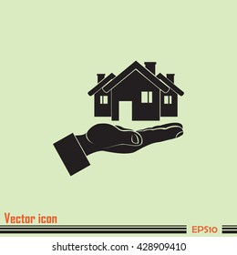 House in hand vector icon.