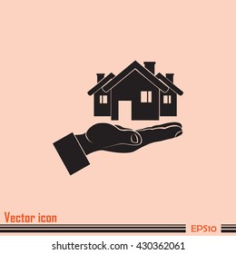 House in hand vector icon.