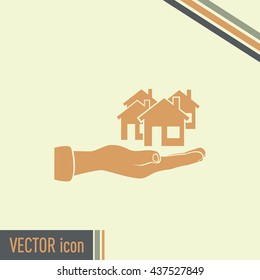 House in hand vector icon.