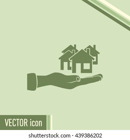 House in hand vector icon.