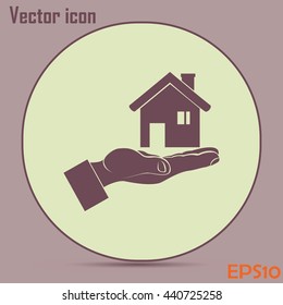 House in hand vector icon.