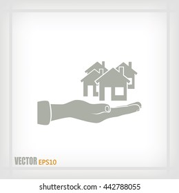 House in hand vector icon.