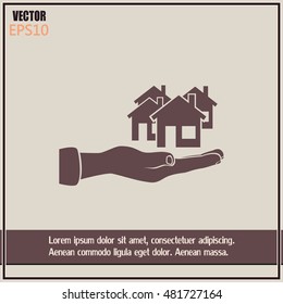 House in hand vector icon.