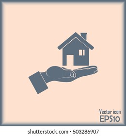 House in hand vector icon.