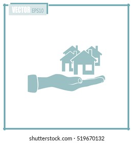 House in hand vector icon.