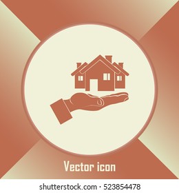 House in hand vector icon.