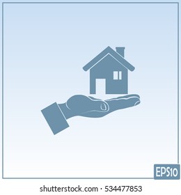 House in hand vector icon.