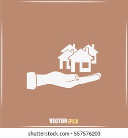 House in hand vector icon.