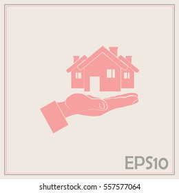 House in hand vector icon.