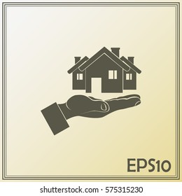 House in hand vector icon.
