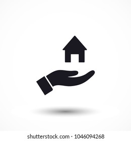 House icon in the hand