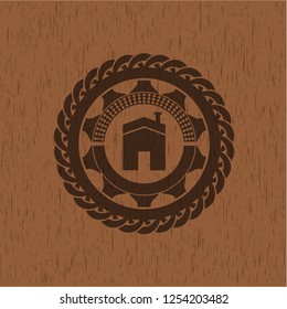 house icon inside badge with wooden background