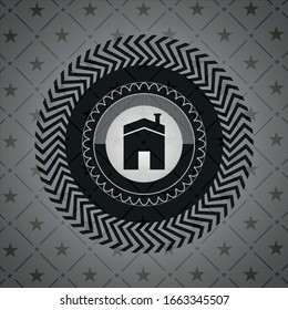 house icon inside black badge