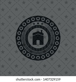 house icon inside black emblem